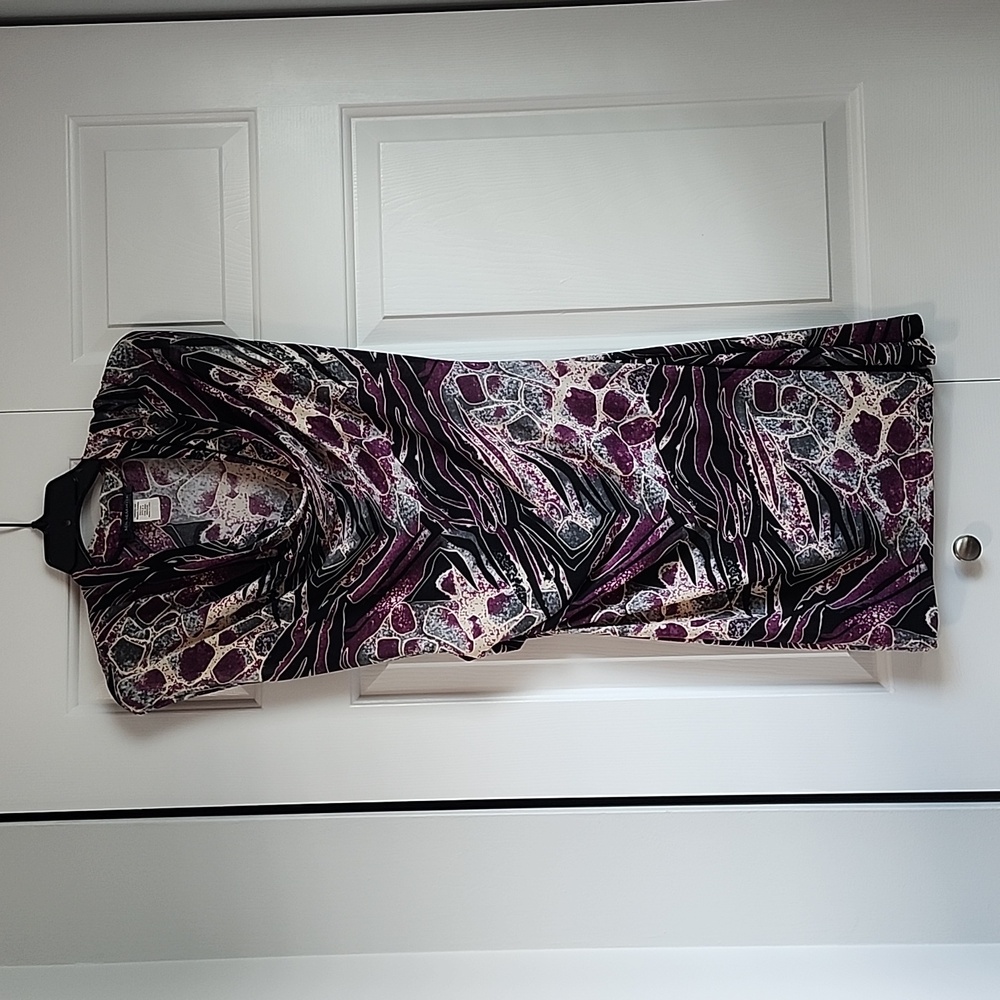 Purple with black, gray, and white throughout night out or wedding guest dress